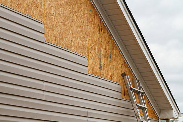 Professional Siding technician working in Lawrenceville, GA